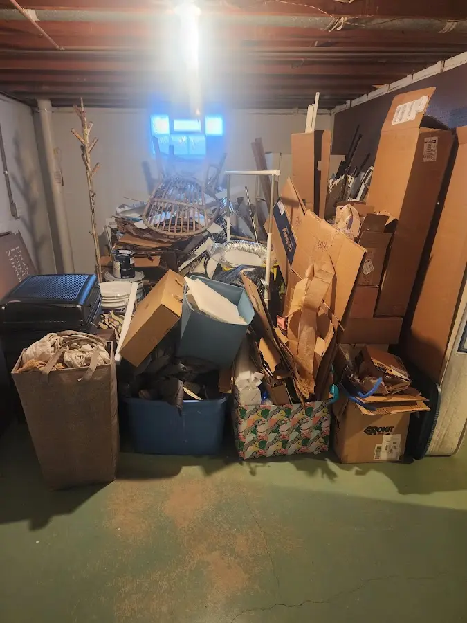 Roll-off dumpster container at job site for 4 Yard Dumpster Rental in Southern Shores